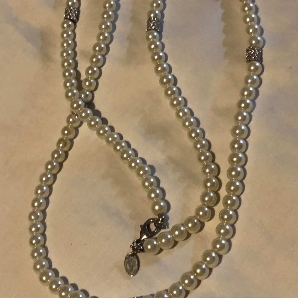 Pearl necklace with CZ stones.